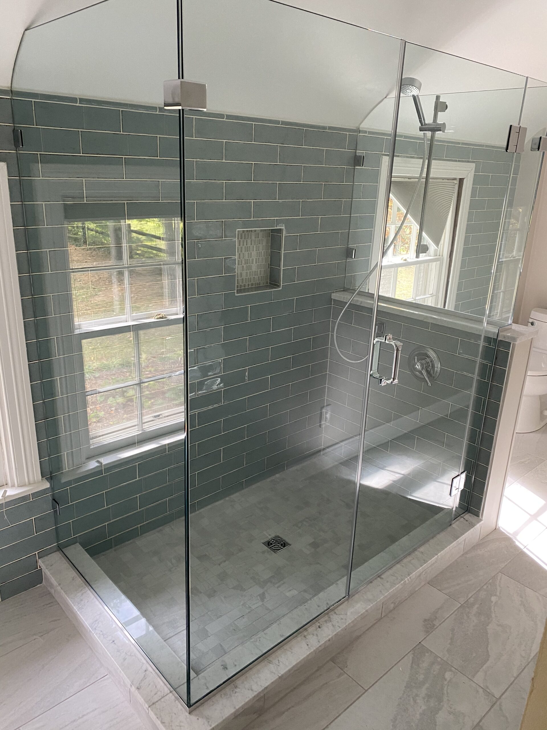 Remodeled glass shower in a Towson home.