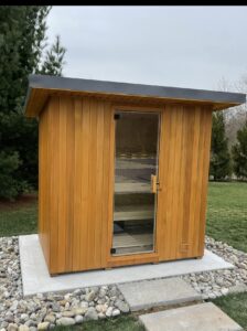 A custom built outdoor sauna designed and installed by Five One Eight Contracting.