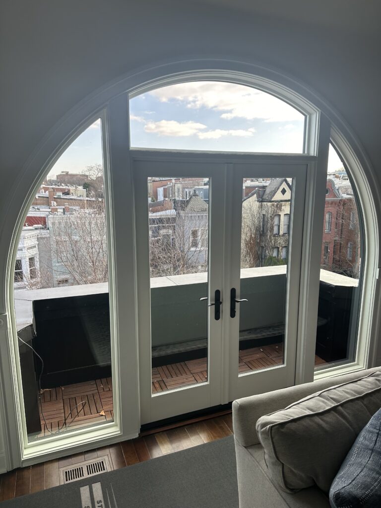 Commercial building with newly installed glass balcony doors.